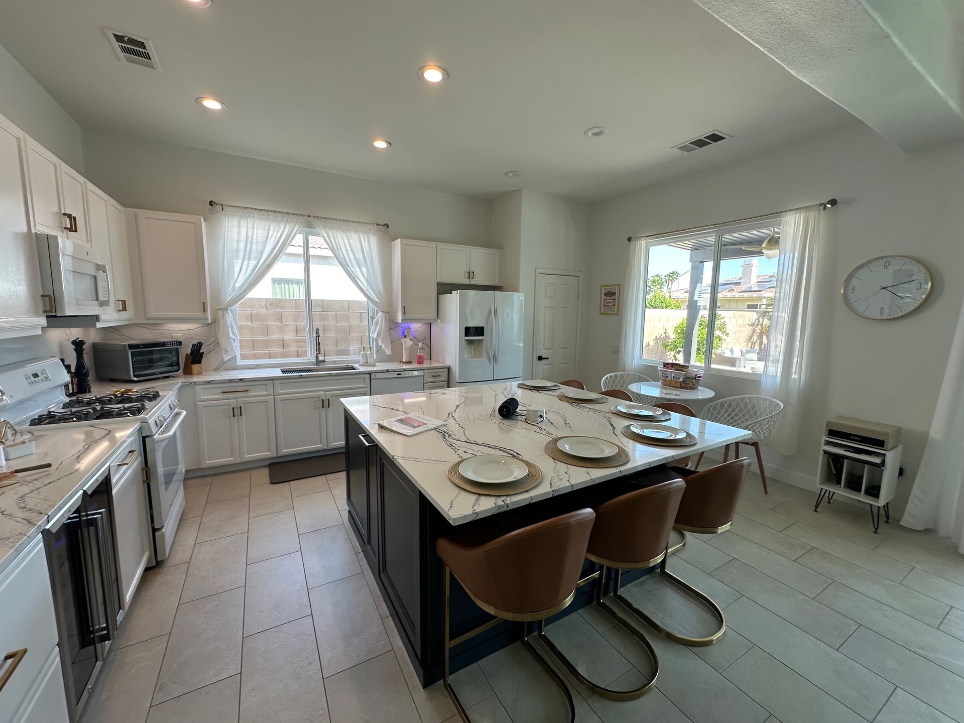Bright kitchen with white cabinets
