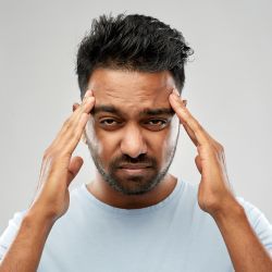 Person with Headaches