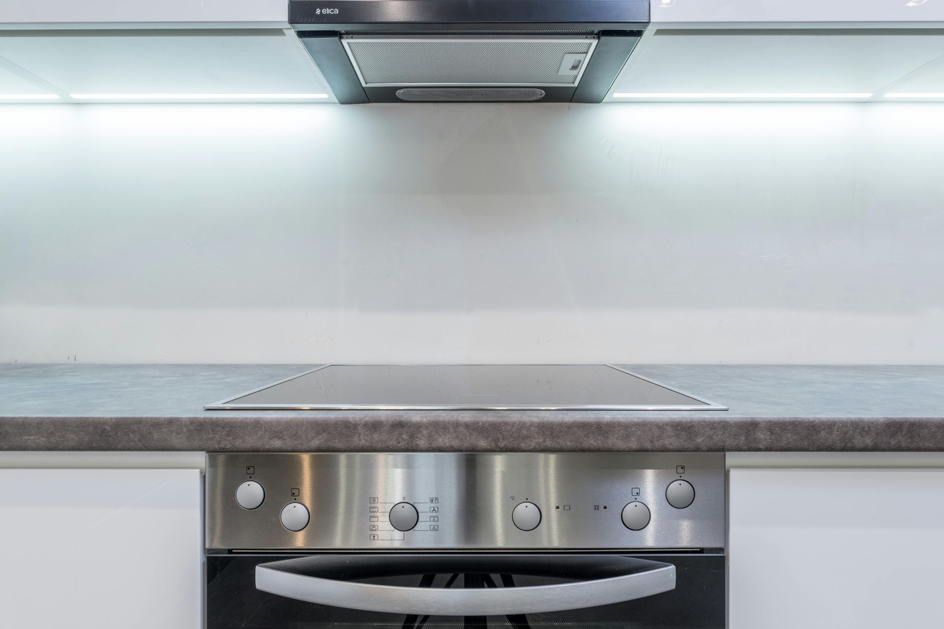 An efficient stainless steel ice machine featuring a sleek design, capable of producing large quantities of ice tubes.