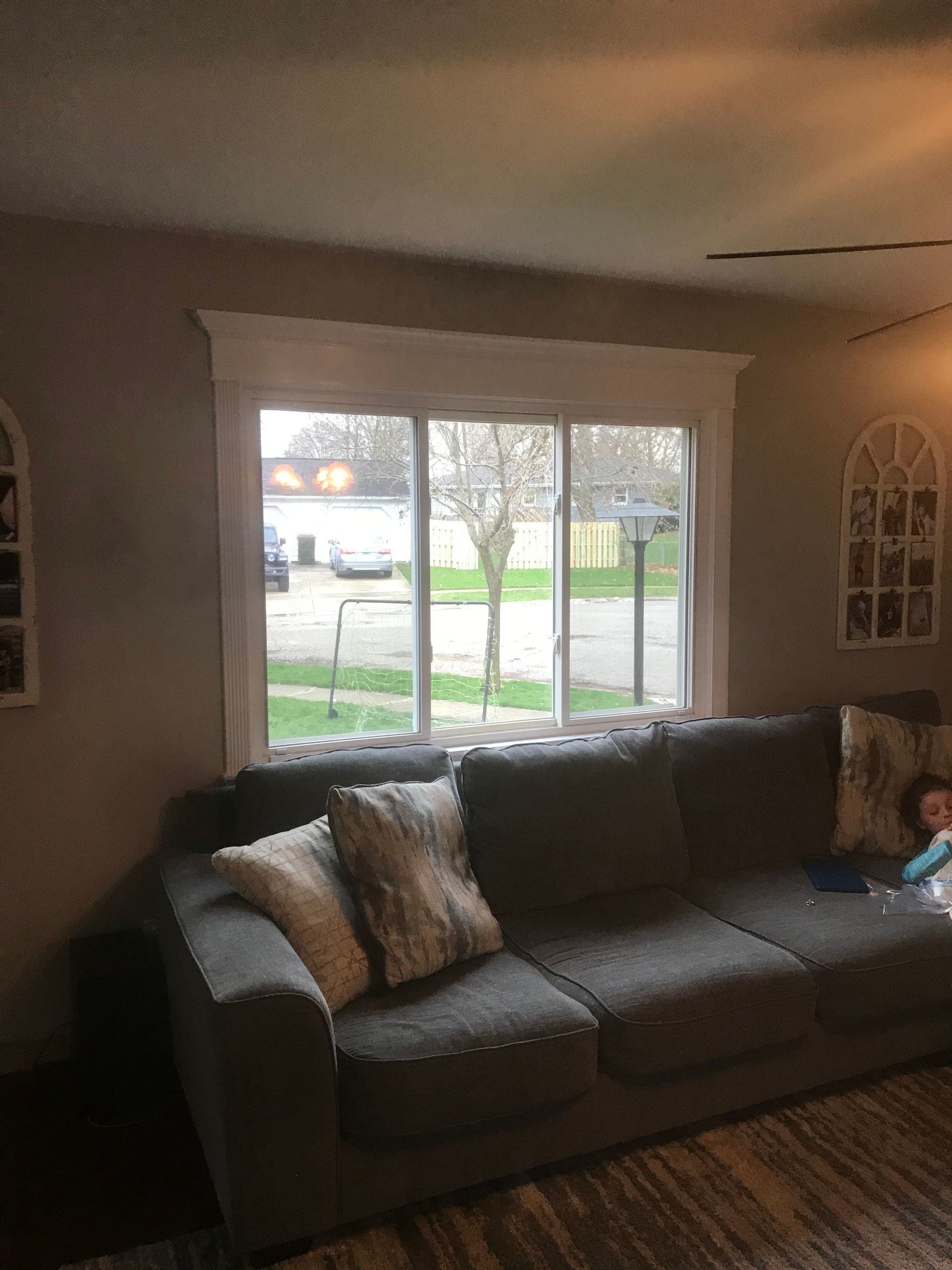 Compact kitchen with stainless steel appliances, gray cabinets, wood ceiling, and brick accent wall. Compact kitchen with stainless steel appliances, gray cabinets, wood ceiling, and brick accent wall.