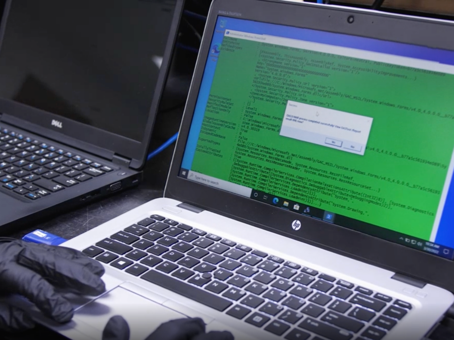 Technician reformatting a laptop