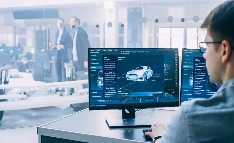 Automotive worker on computer