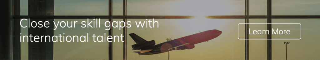 Airliner taking off at sunset. Text reads