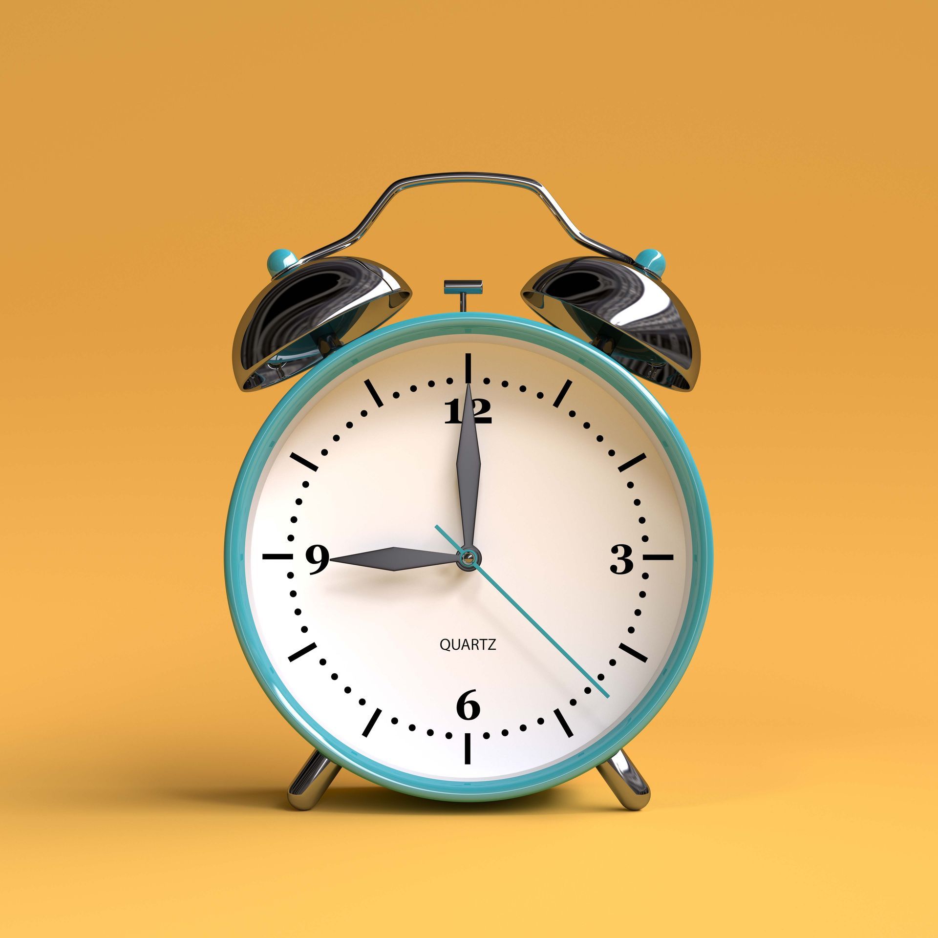 Blue and chrome alarm clock on yellow background; time shown is 9:00.
