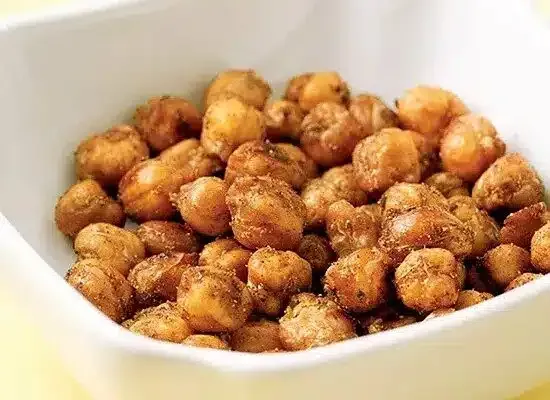 Bowl of roasted chickpeas seasoned with spices