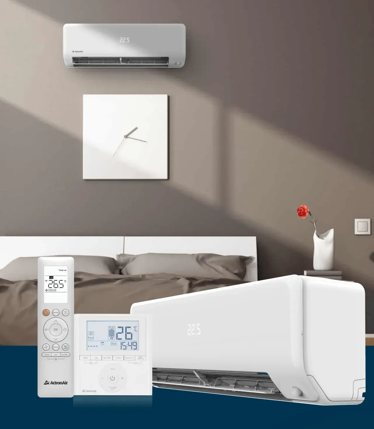 Wall-mounted white air conditioner above a bed with remote and thermostat in a modern bedroom.