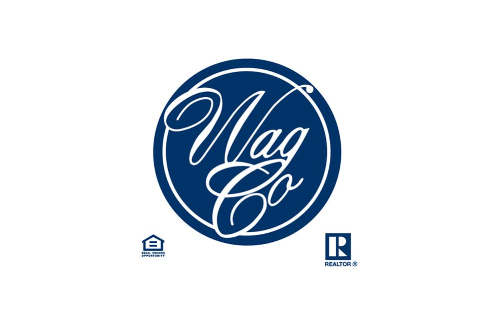 a blue and white mag co logo on a white background
