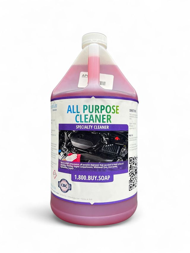Pink jug of all-purpose cleaner with white handle and purple label on a white background