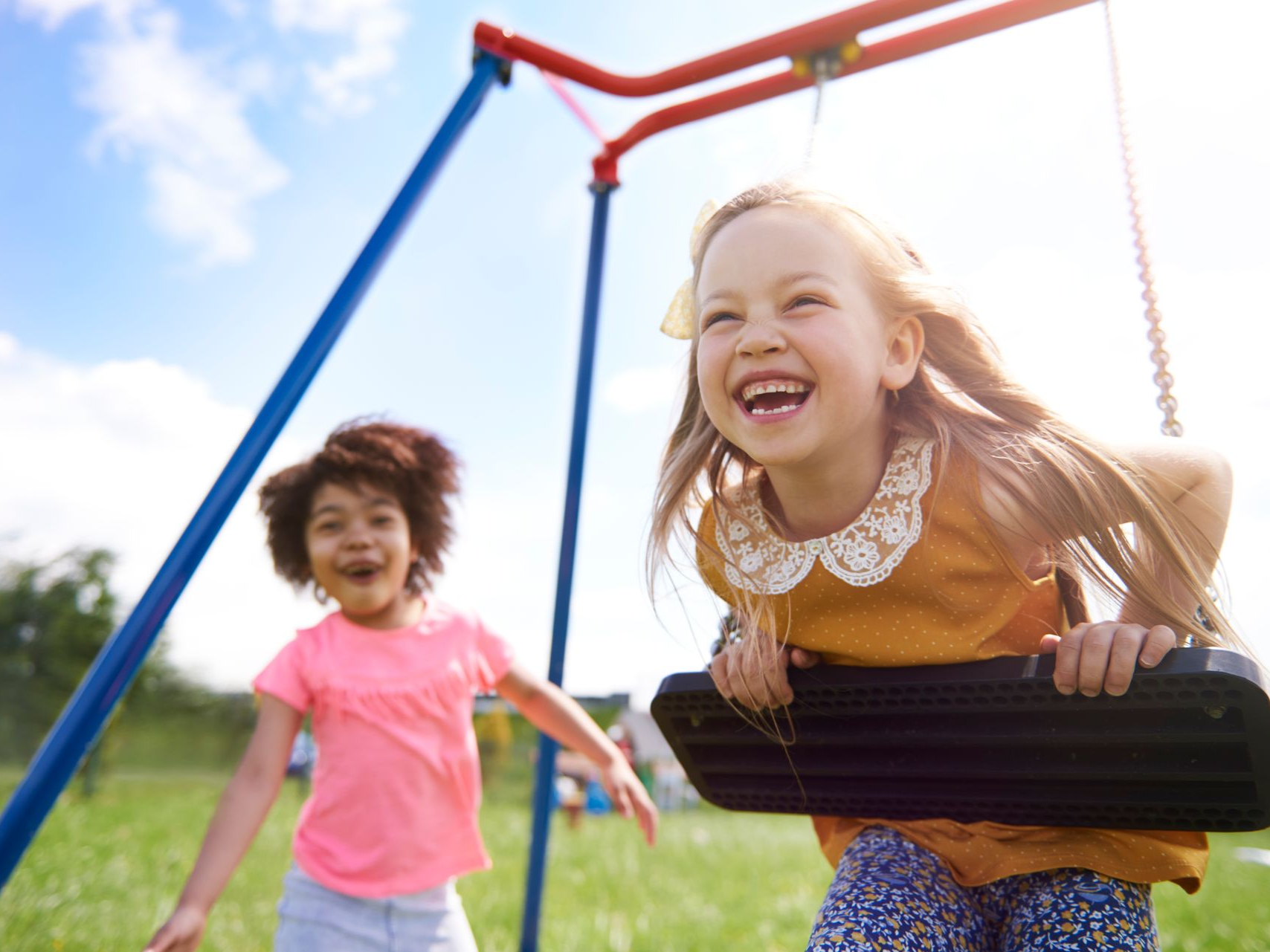 Girls on swing