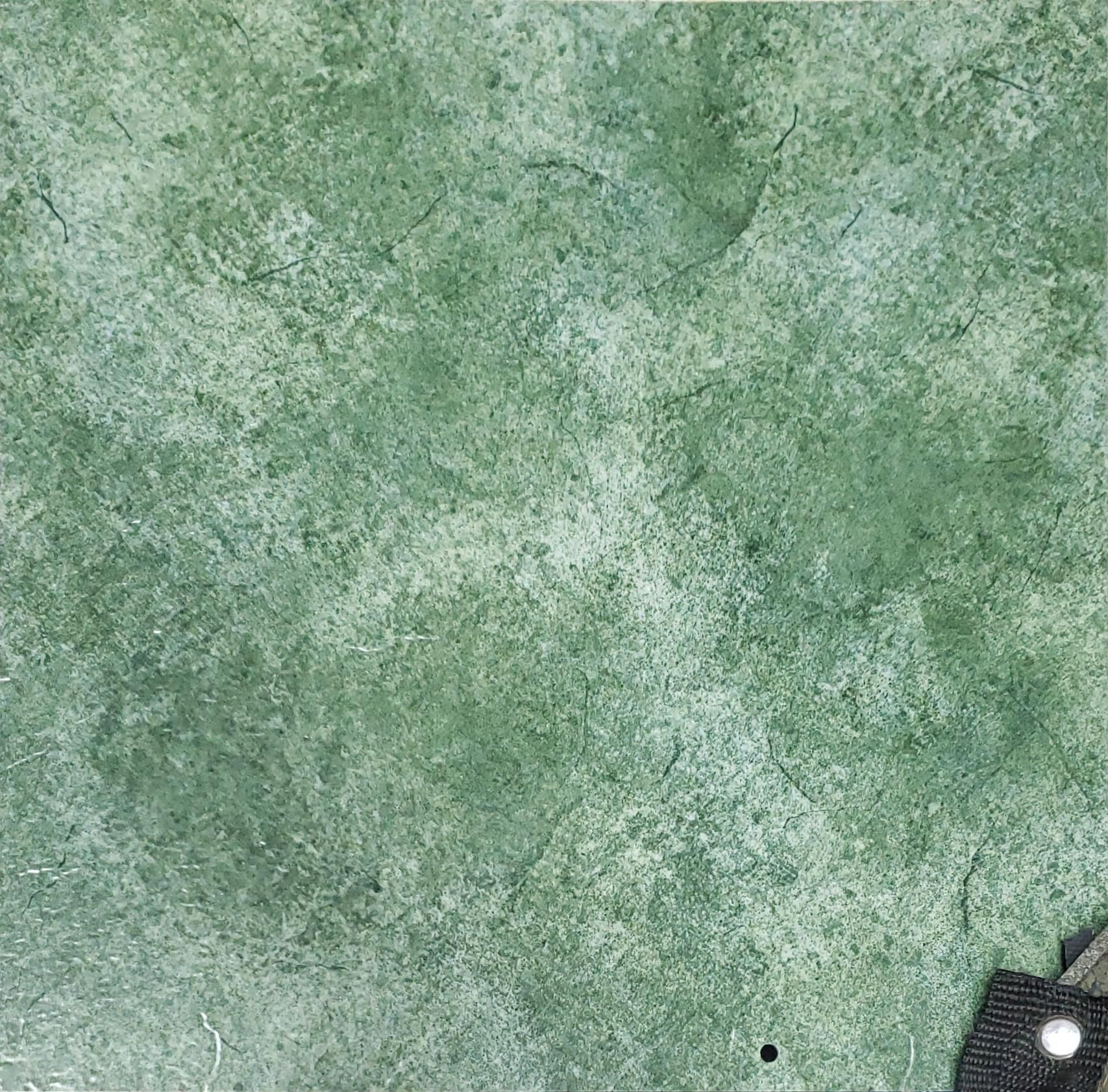 Un primer plano de una textura de mármol verde