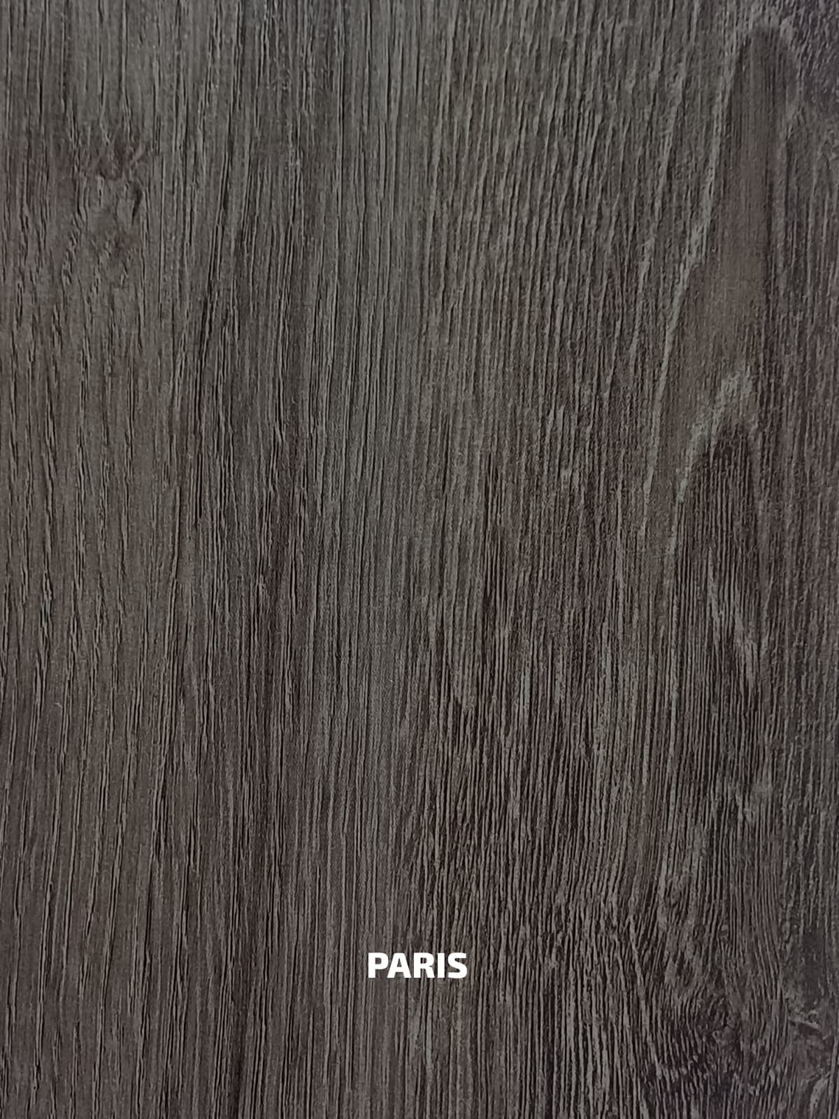 Un primer plano de un trozo de madera con la palabra París.