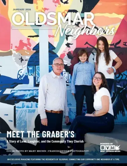 Four people posing in front of a colorful mural for an Oldsmar Neighbors magazine cover