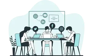 Three people collaborate at a desk with laptops, discussing social media analytics on a presentation screen.