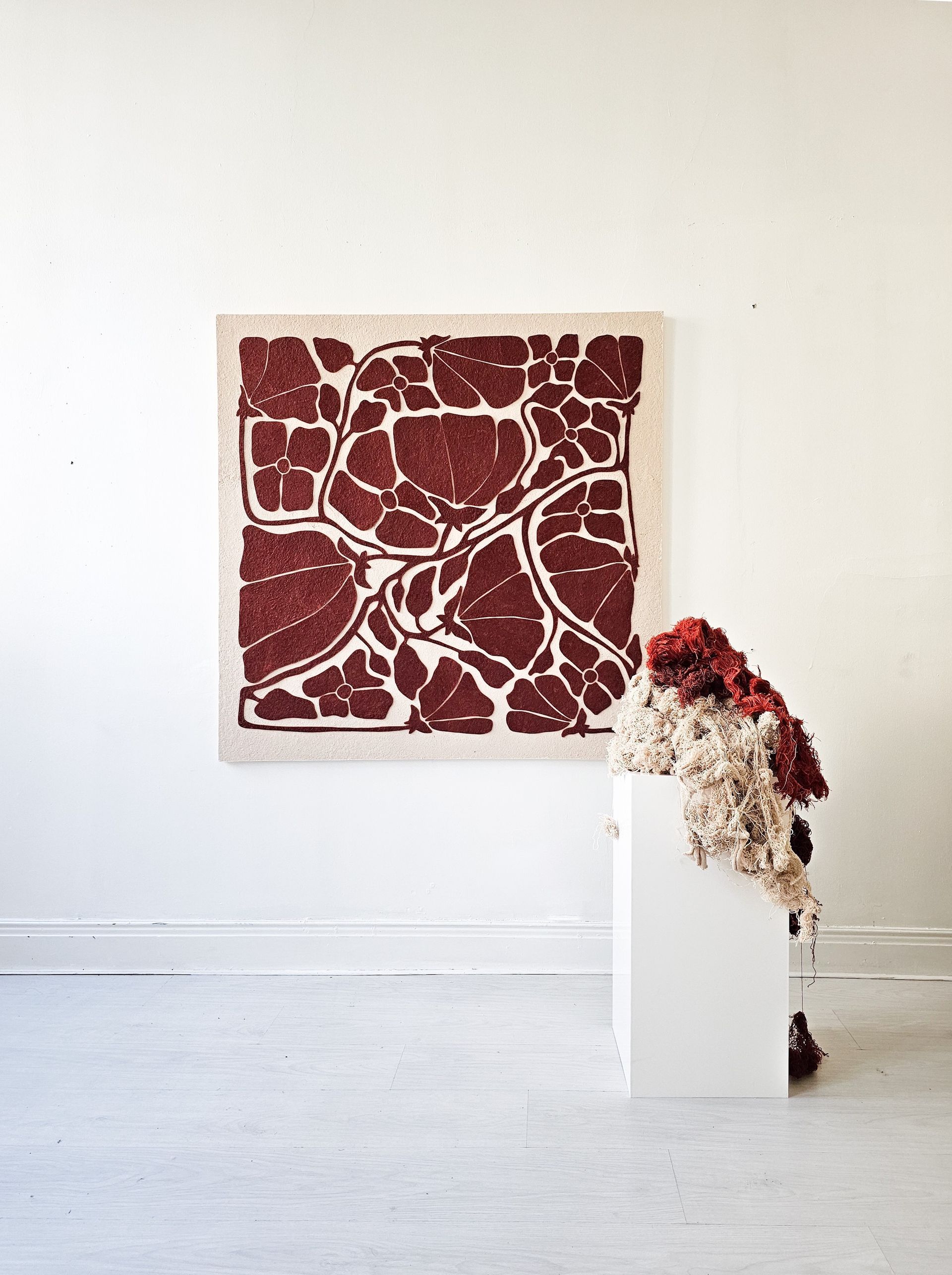 Eco-friendly wall art panel crafted from recycled textile fibers.
