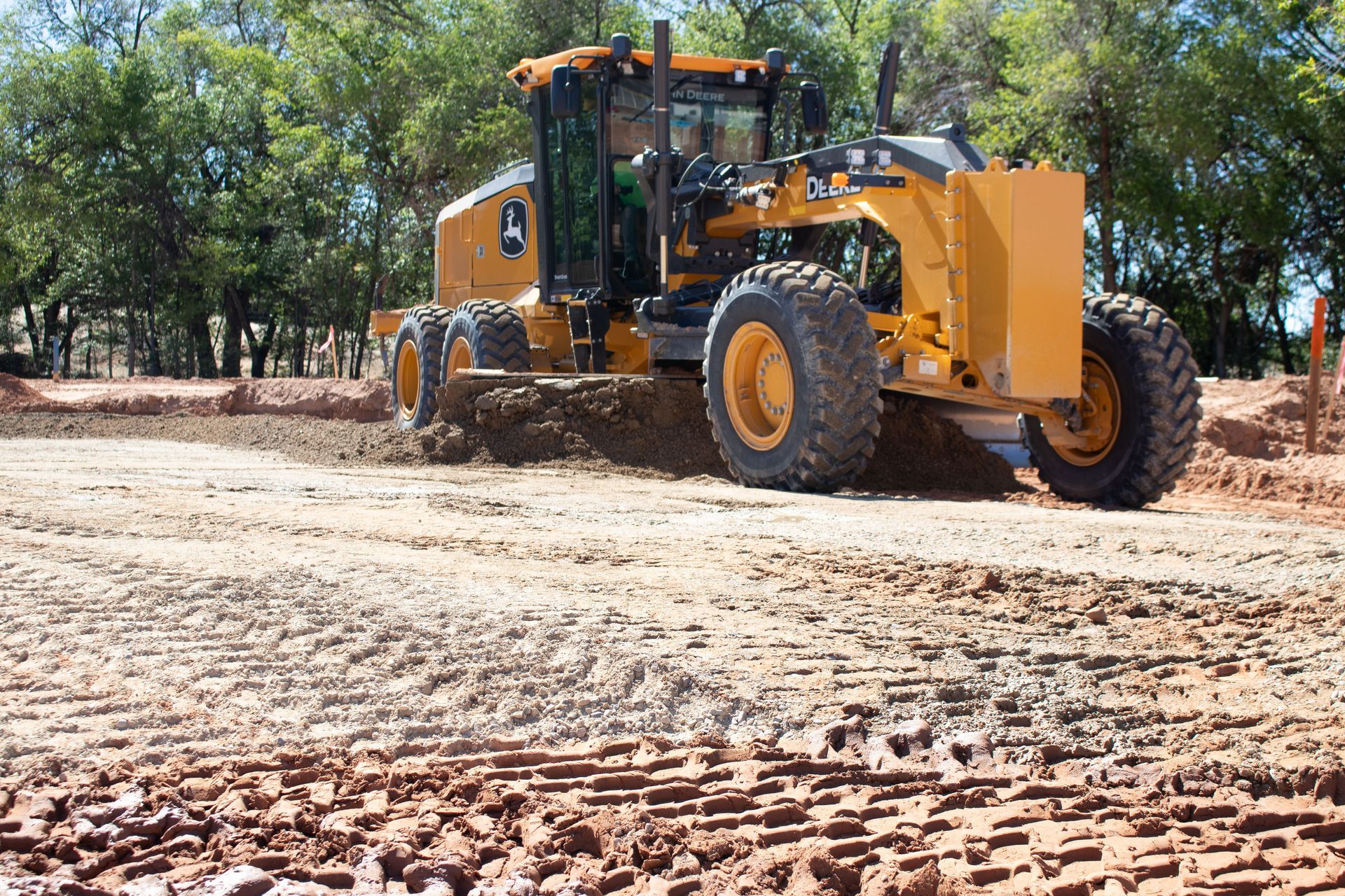 A bulldozer is moving dirt on a construction site.