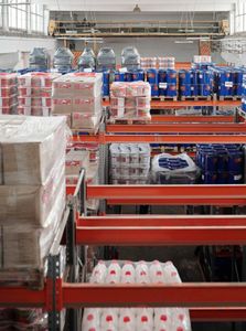 A warehouse filled with lots of containers and boxes
