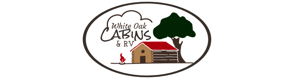 Whiting Oaks ARIA & RV logo with a cabin, tree, and oval border