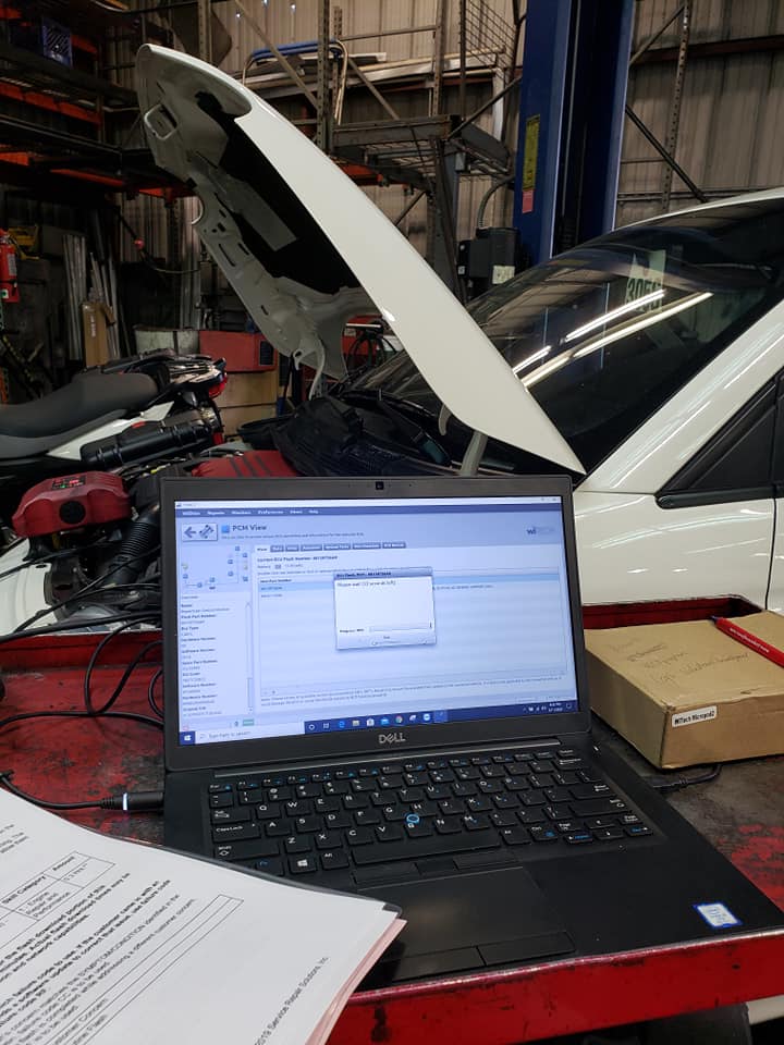 Laptop Connected To Vehicle For Diagnostics | Main Street Auto Shop