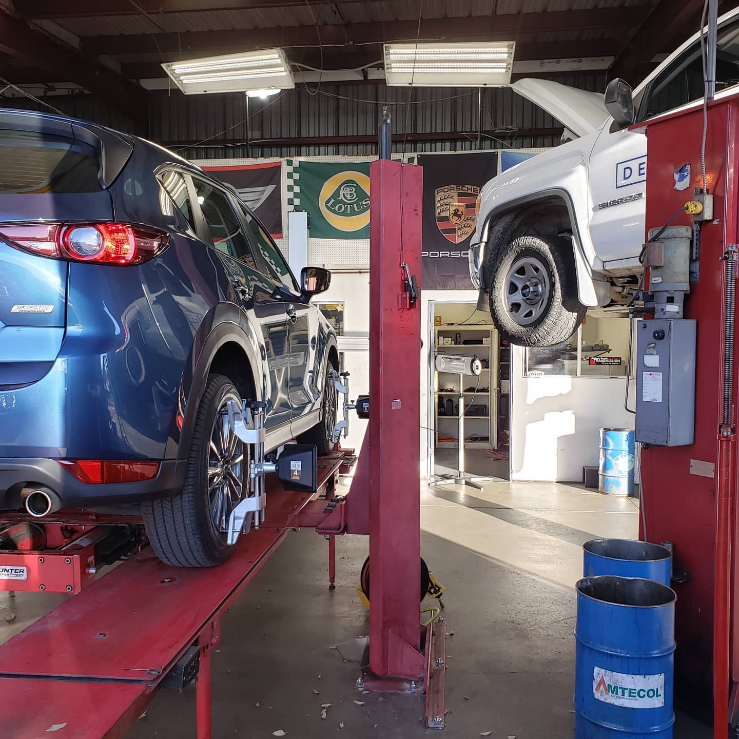 Blue SUV On Lift Inside Auto Repair Shop | Main Street Auto Shop