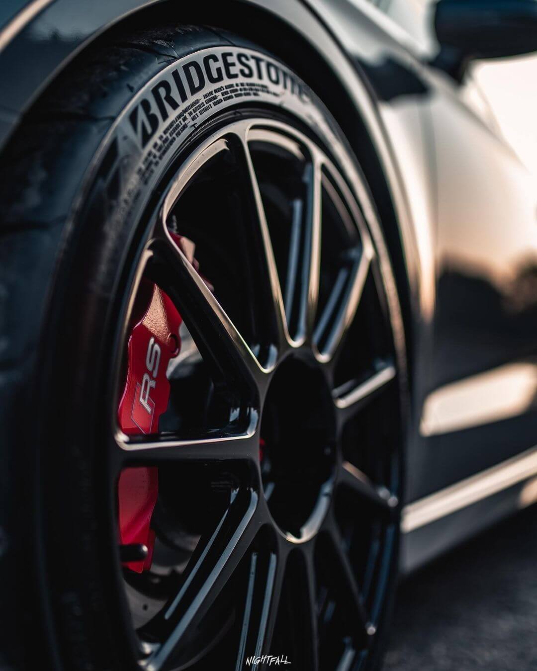 Black Neuspeed Wheel With Bridgestone Tire | Main Street Auto Shop