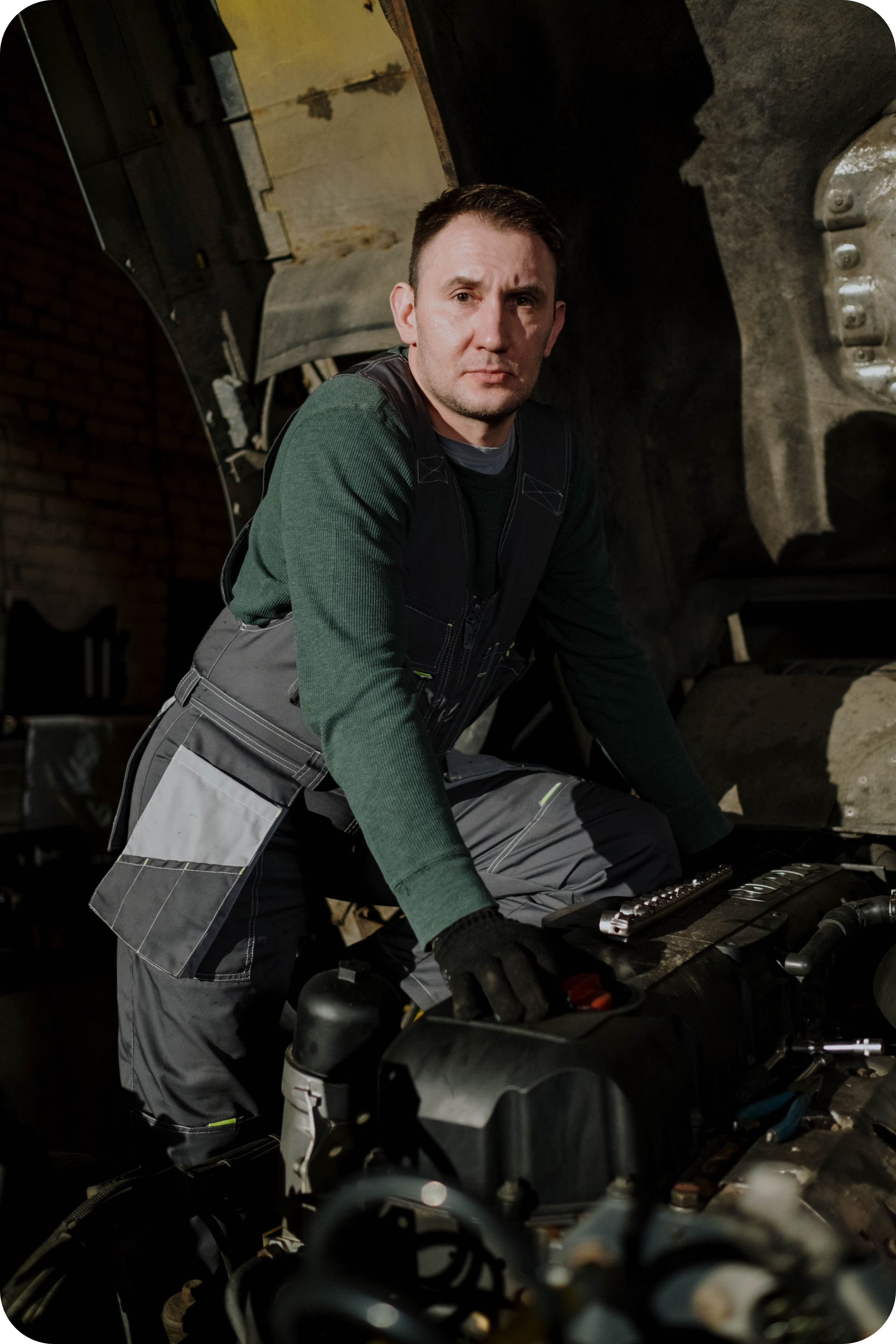 A Team Member Of Main Street Automotive Working On An Engine | Main Street Auto Shop