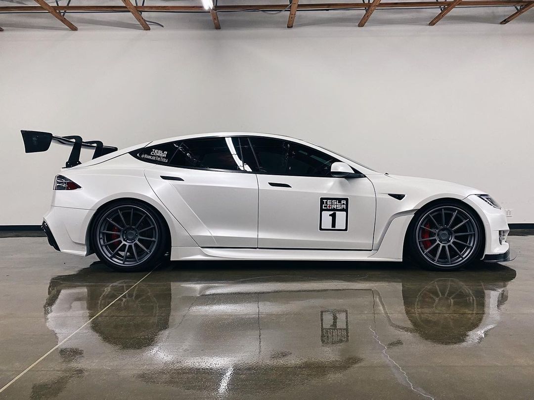 White Tesla Model 3 With Unplugged Performance Livery | Main Street Auto Shop