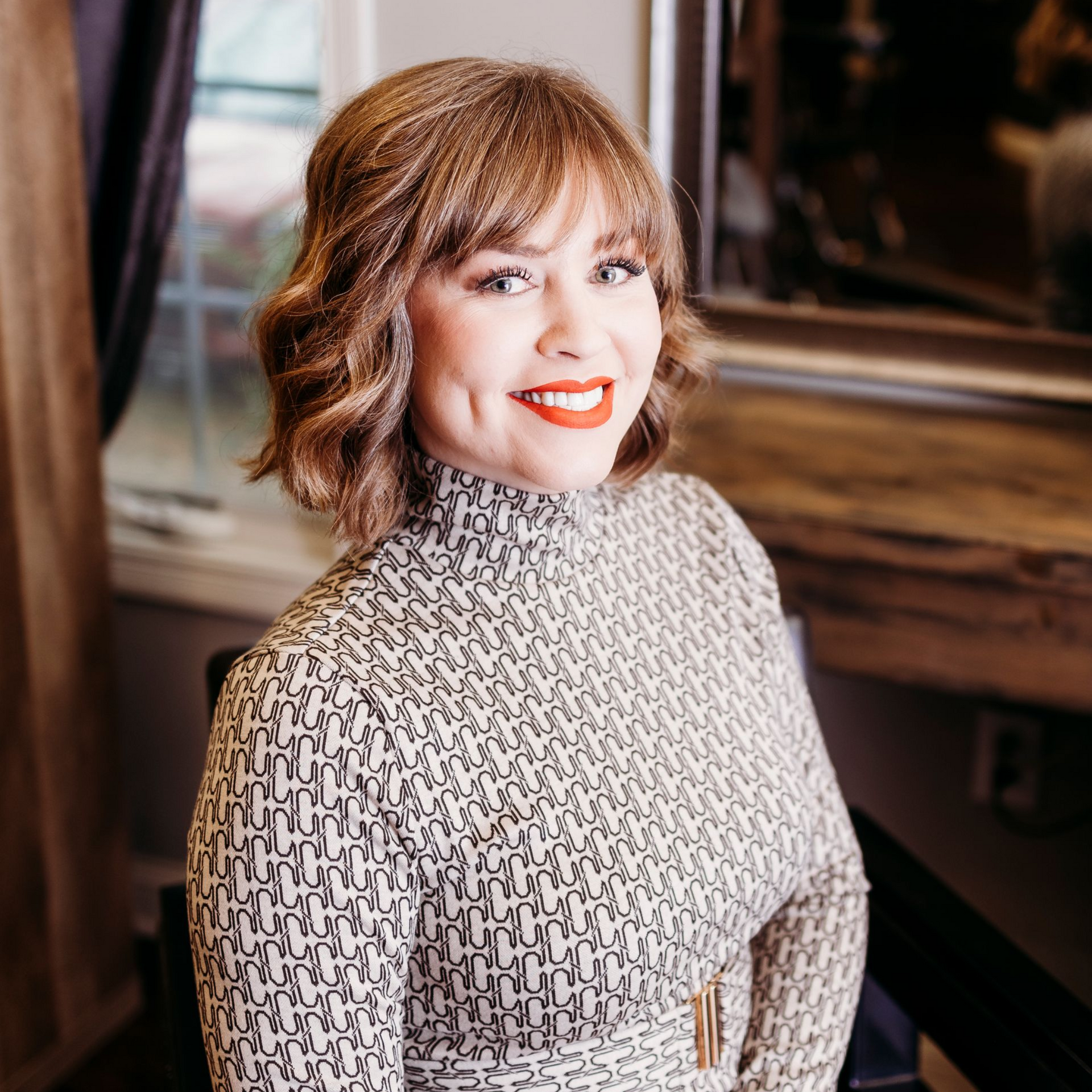 Jesslyn Wallace is a stylist at Cass and Company Salon in Avon, Indiana.