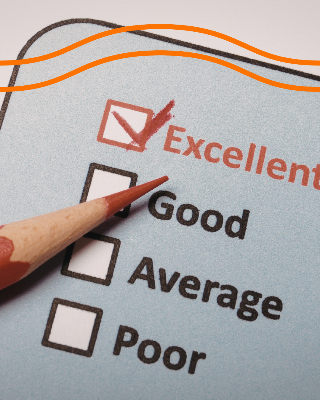 Pencil checking the “Excellent” box on a satisfaction survey with options Good, Average, and Poor