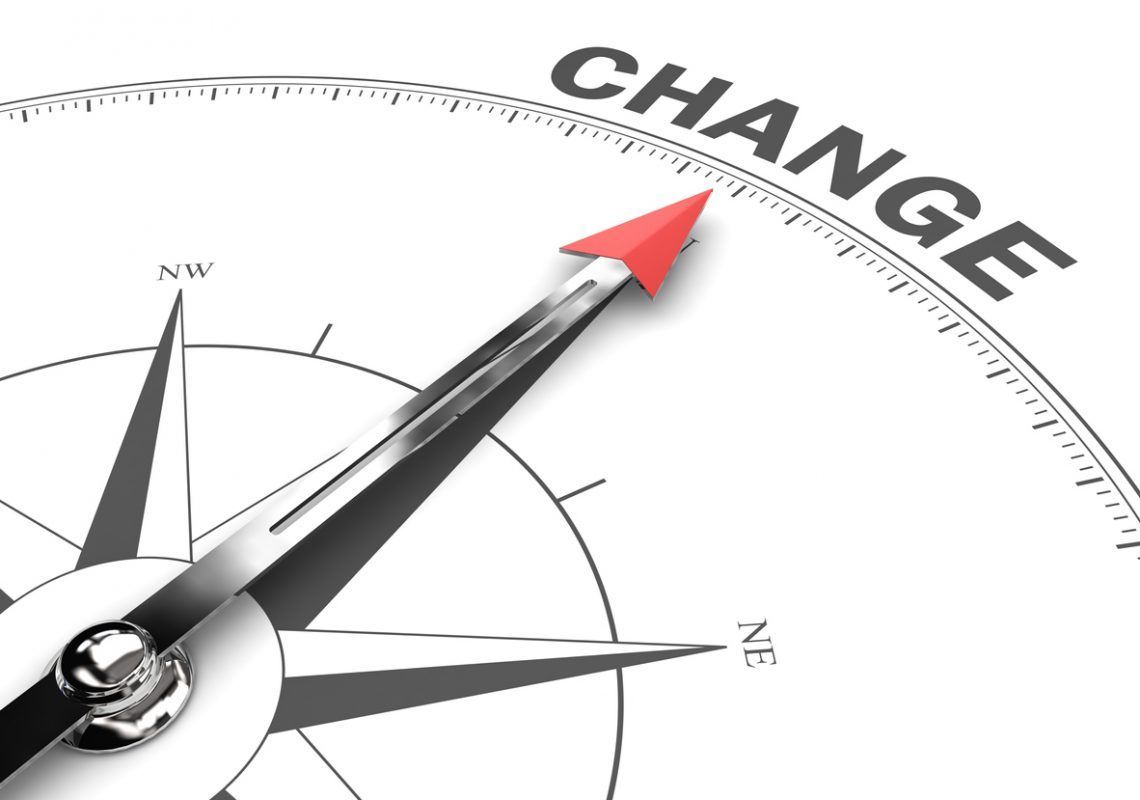 Compass pointing to change