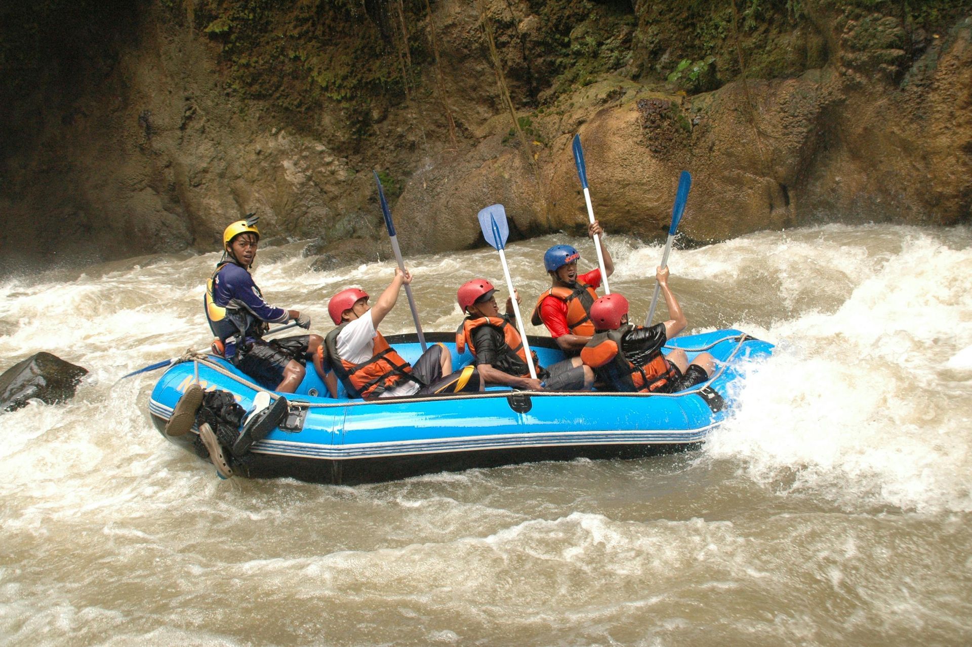 Rafting guides on river
