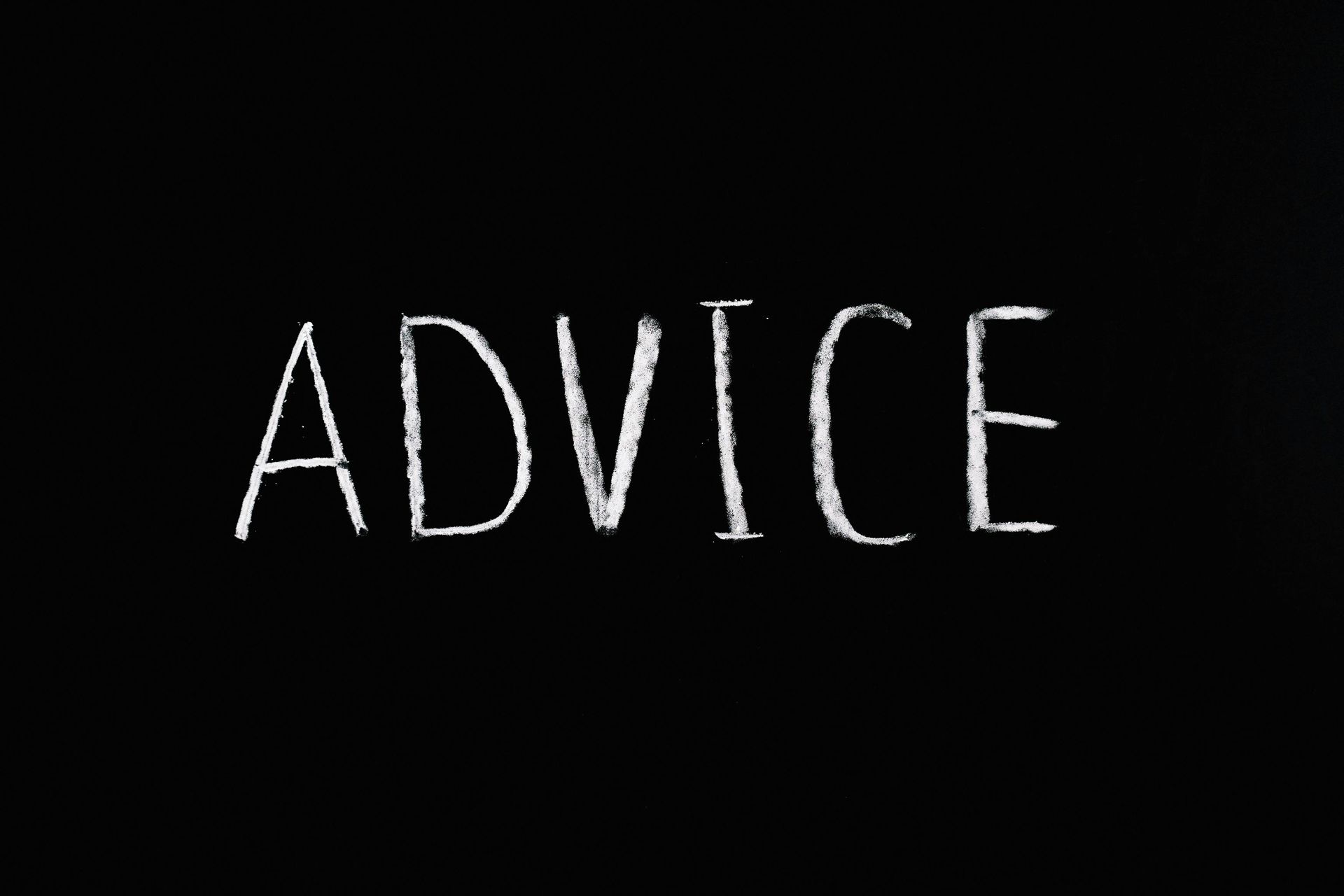 Black image with the word Advice in white