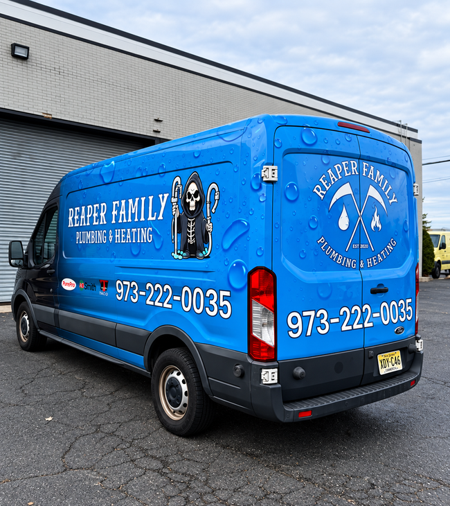Blue Harper Family Heating & Cooling van parked outside a warehouse, with company logo and phone number.
