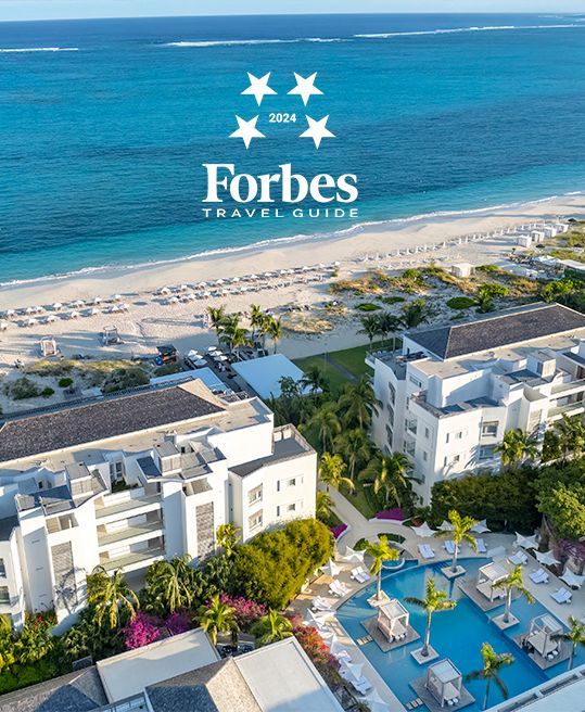 An aerial view of a forbes travel guide hotel