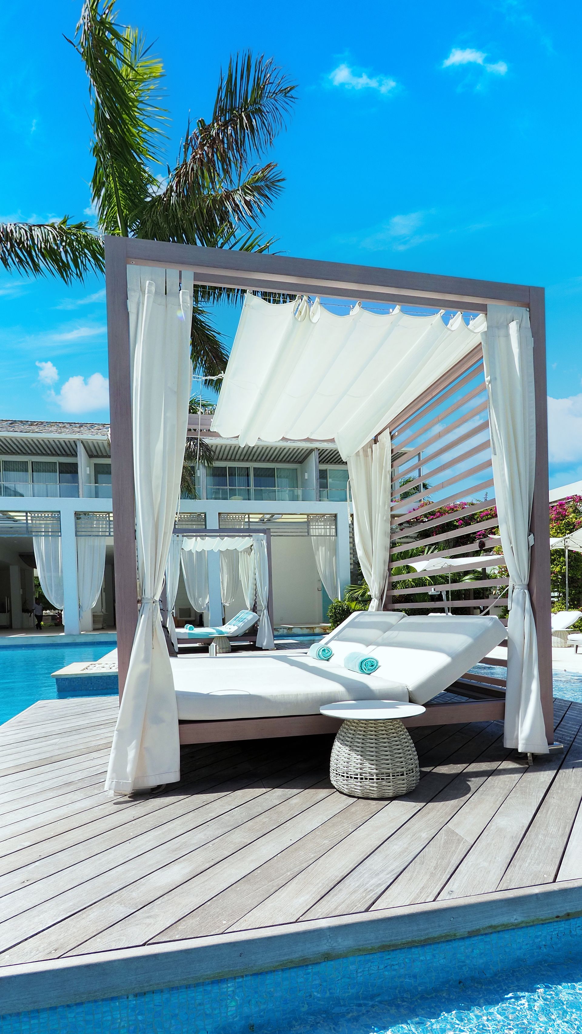 A swimming pool with a canopy over it
