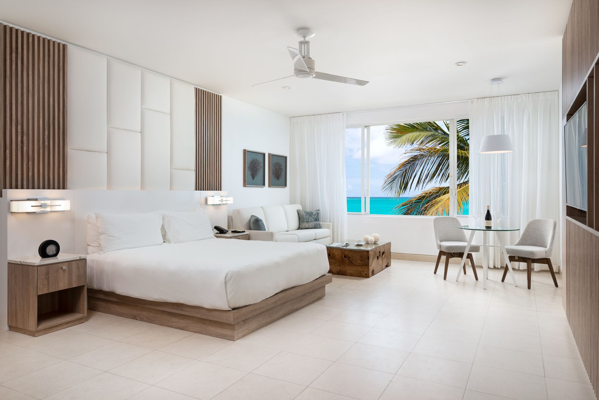 An artist 's impression of a hotel room with a king size bed