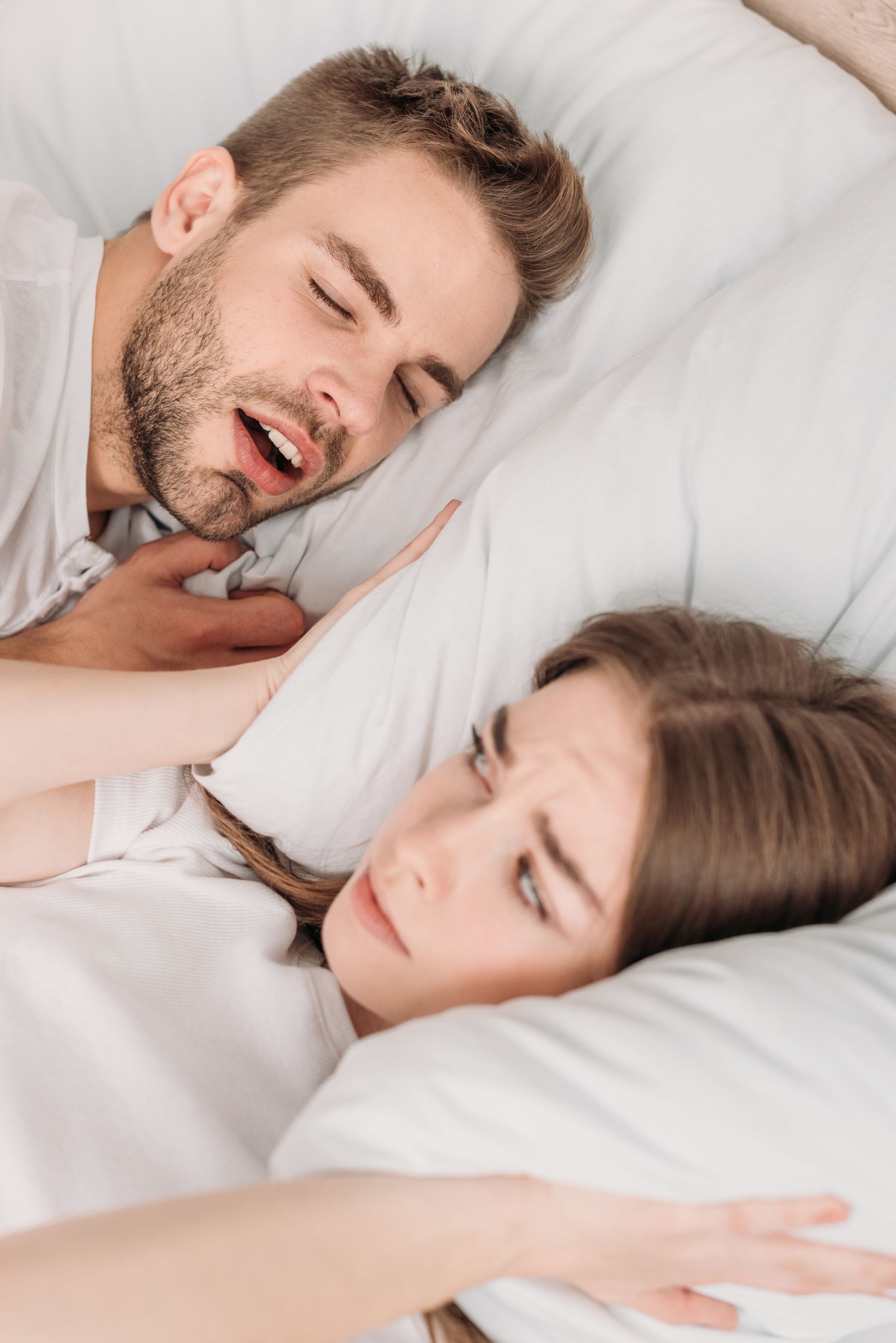 A stethoscope is next to a piece of paper that says sleep apnea