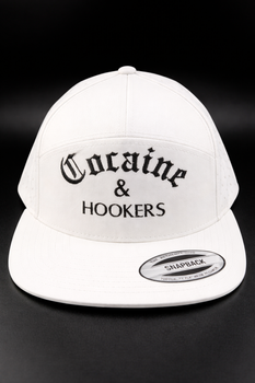 A white snapback cap featuring the black embroidered text