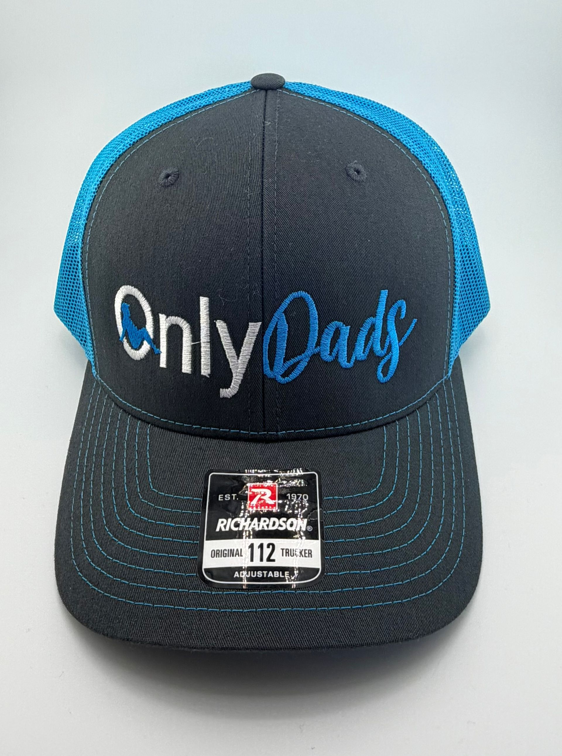 A black and bright blue trucker hat with 