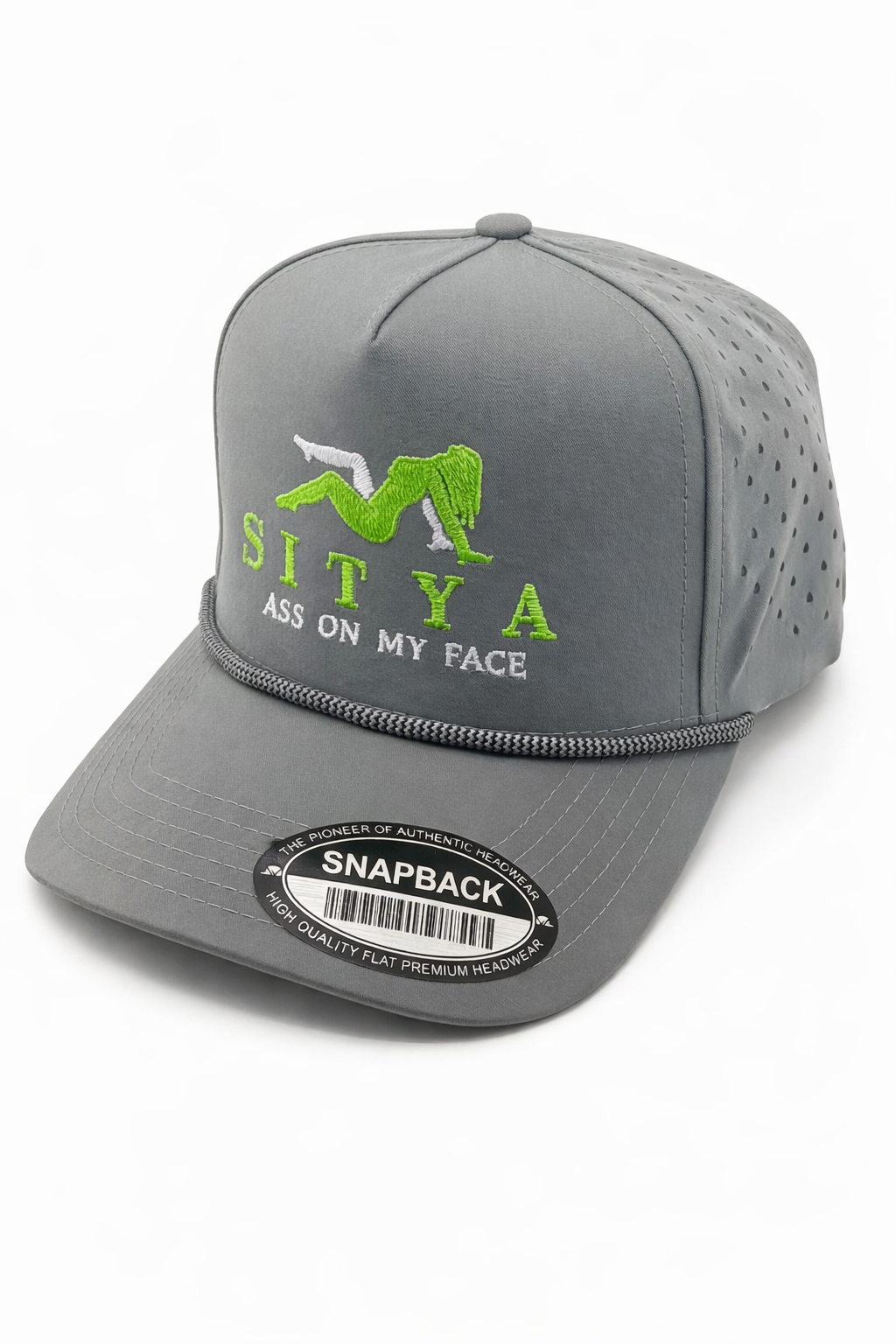 A gray snapback cap with a rope accent, featuring an embroidered lime green figure and the text "SITYA ASZ ON MY FACE."