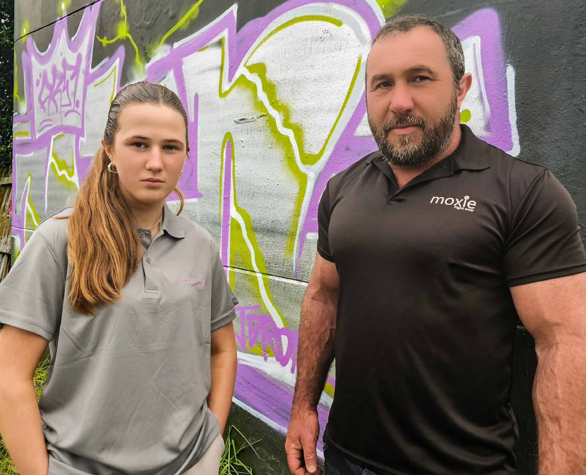 Moxie Fightwear Unisex Polo Neck Shirt grey with purpley-pink hue logo