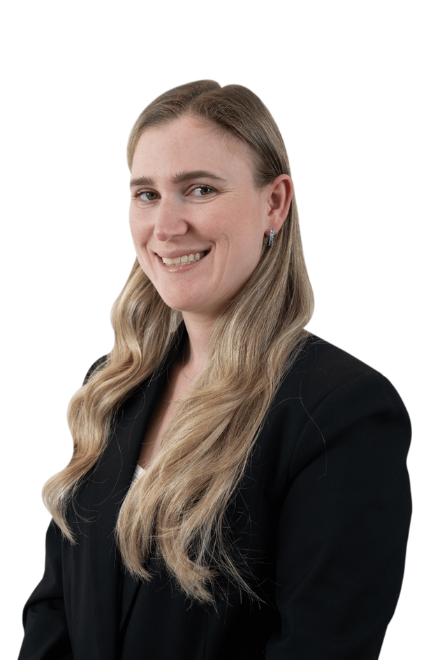 Portrait of a smiling person in a black blazer against a white background