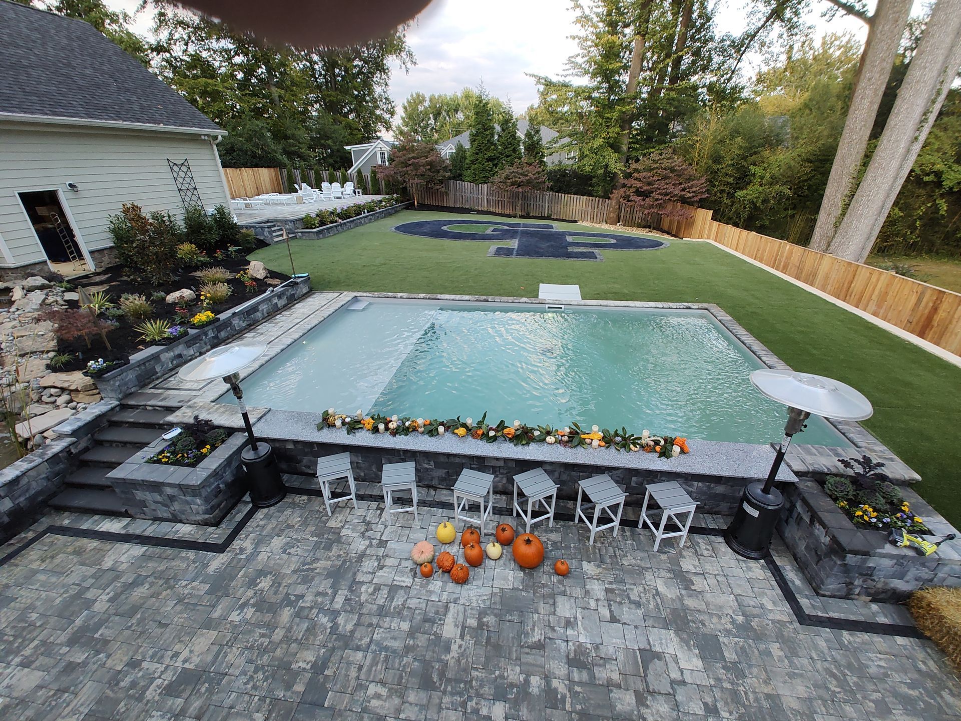 Repaired and resurfaced pool with custom touches