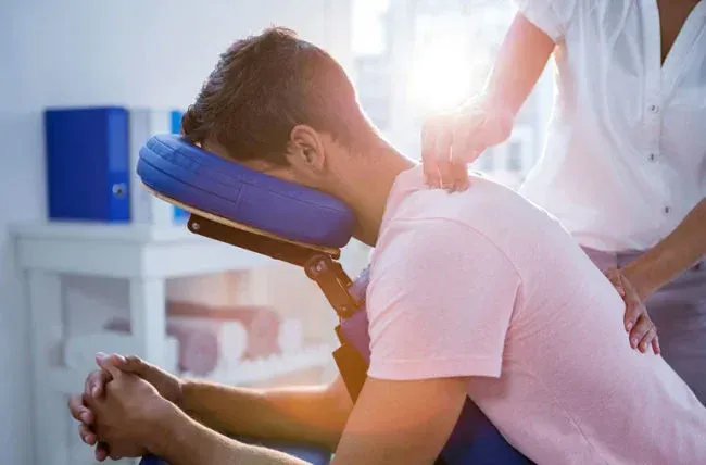 Photo of a chiropractor doing a therapeutic massage