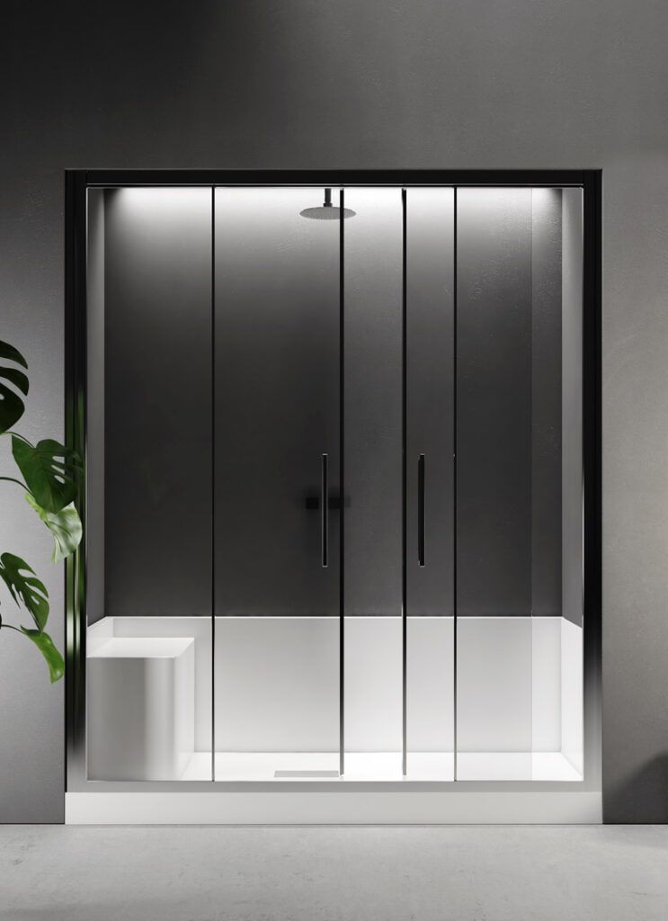 Box doccia moderno in vetro con pannelli scuri e piastrelle bianche in un bagno minimalista.