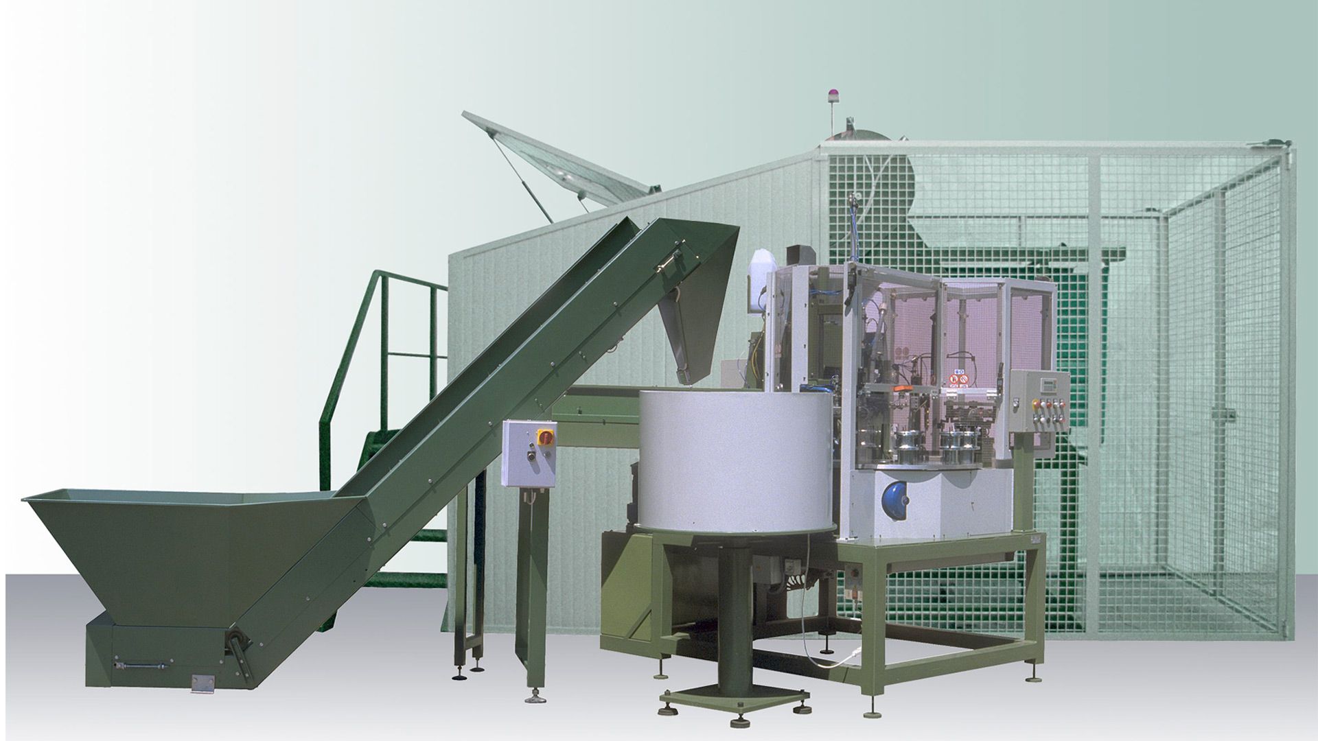 macchina automatica per calettamento mozzi in plastica su anelli in gomma piena e inserimento gabbiette a rulli - STEMAK Automazione