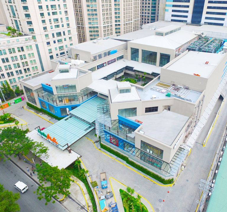 An aerial view of a large building with a sign that says ' a ' on it