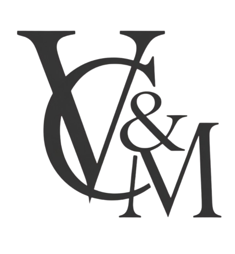 Stylized black monogram logo with overlapping letters V, C, M, and an ampersand on a white background