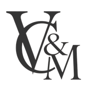 Stylized black monogram logo with overlapping letters V, C, M, and an ampersand on a white background