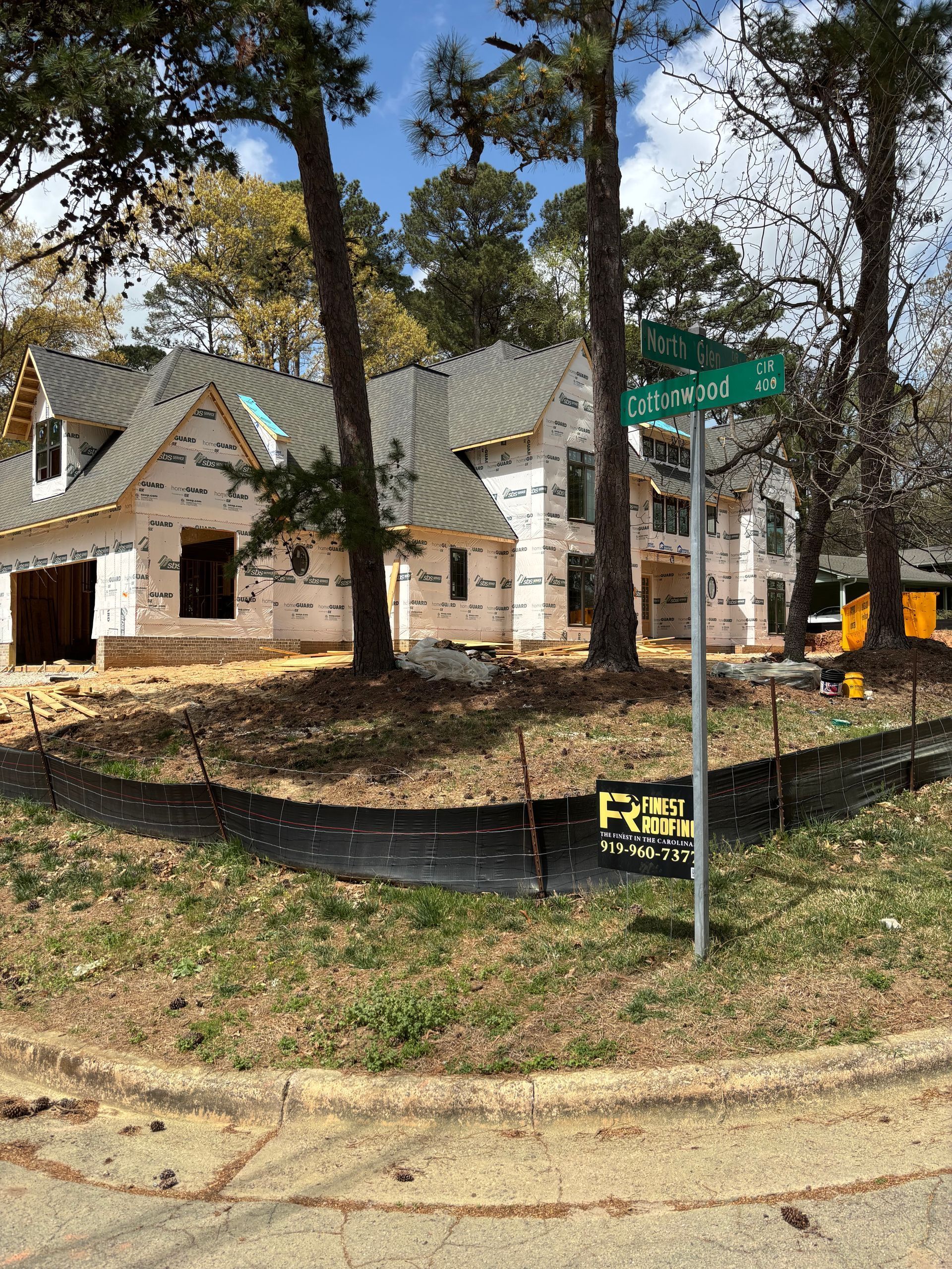 A house is being built in the middle of a forest.