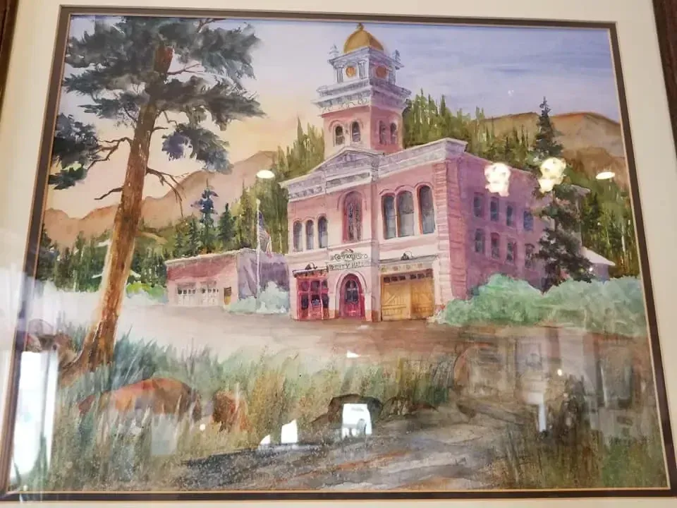 A painting of a building with a clock tower